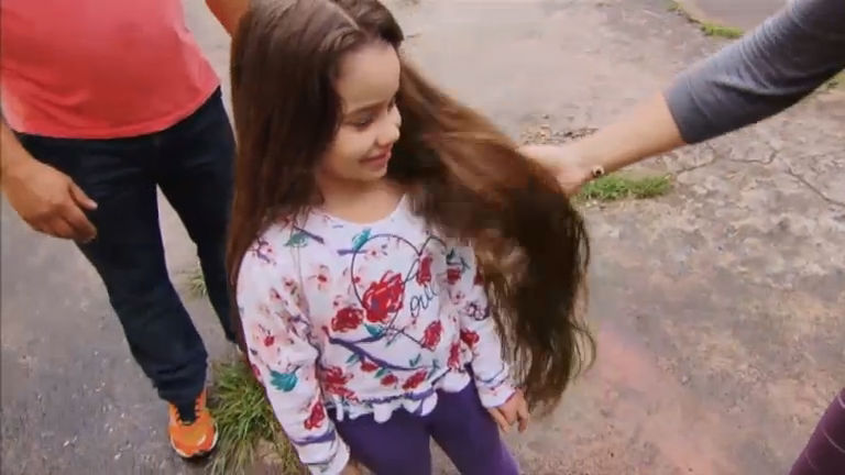 Domingo Show menina maior cabelo