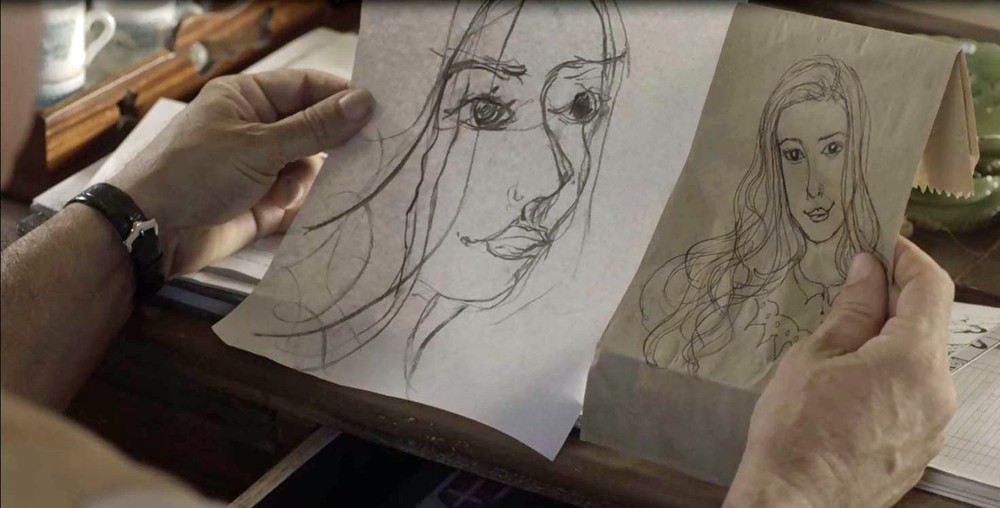 Geraldo (Jackson Antunes) compara desenho que encontrou na rua com o de Ignácio (Bruno Cabrerizo)