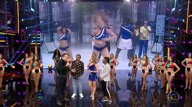 Sheila Mello e seus colegas de É o Tchan, no Domingão do Faustão, da Globo