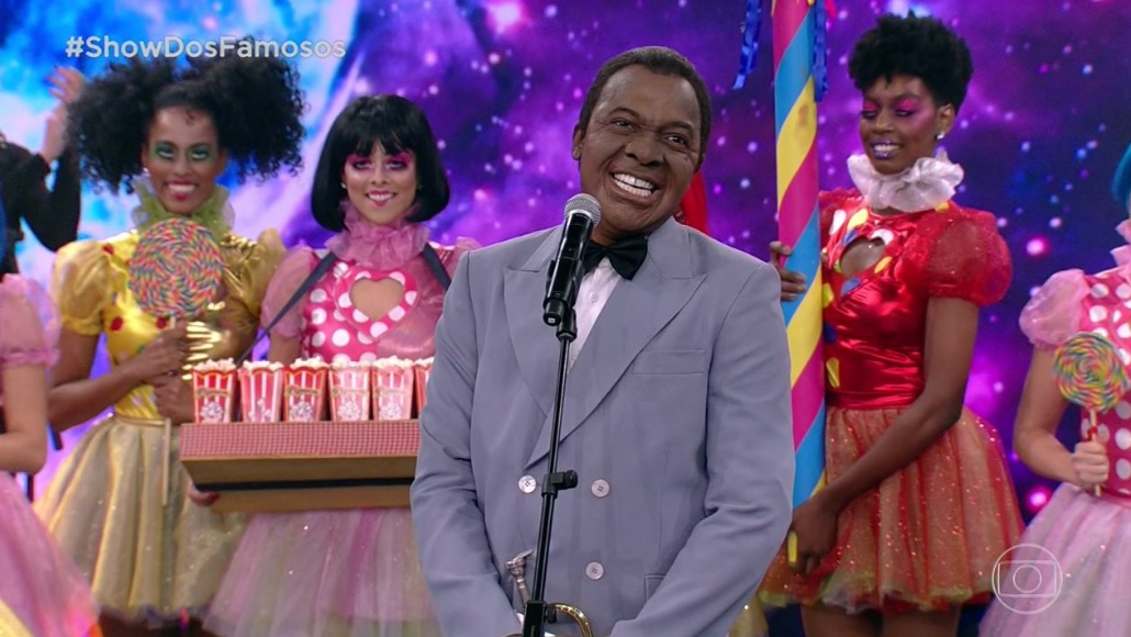 Mumuzinho como Louis Armstrong no Show dos Famosos