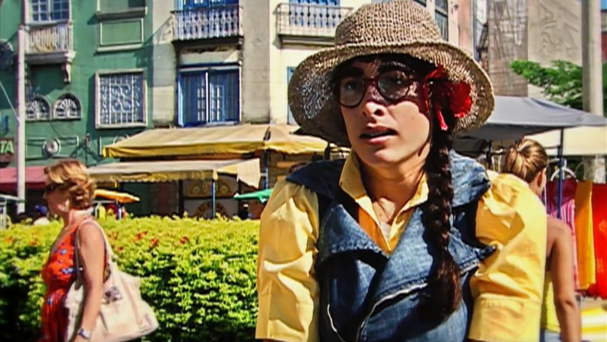 Bela (Giselle Itié) em Bela, a Feia