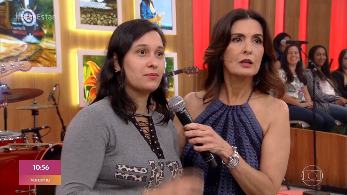 Fátima Bernardes e moça da plateia do Encontro