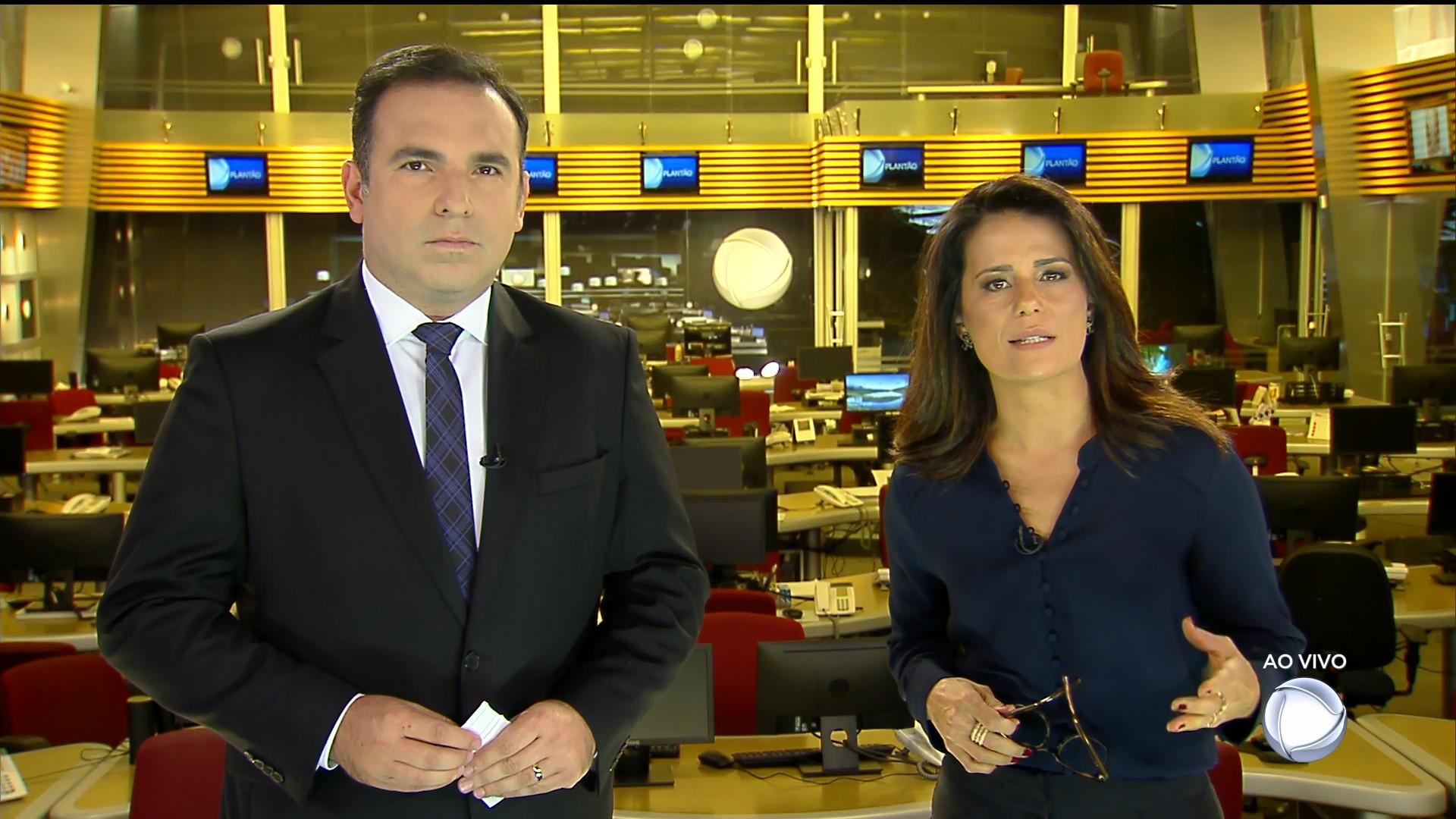 Adriana Araújo e Reinaldo Gottino: apresentadores dividiram plantões na Record TV (Reprodução/Record TV)