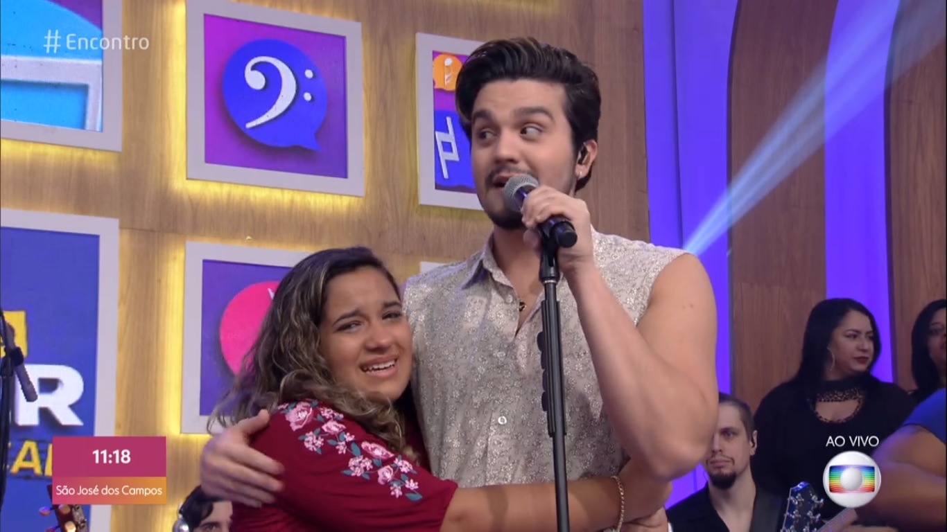Luan Santana com fã no Encontro