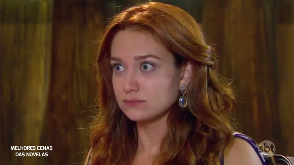 Maria Pinna como Regina em Cúmplices de um Resgate (Reprodução / YouTube)