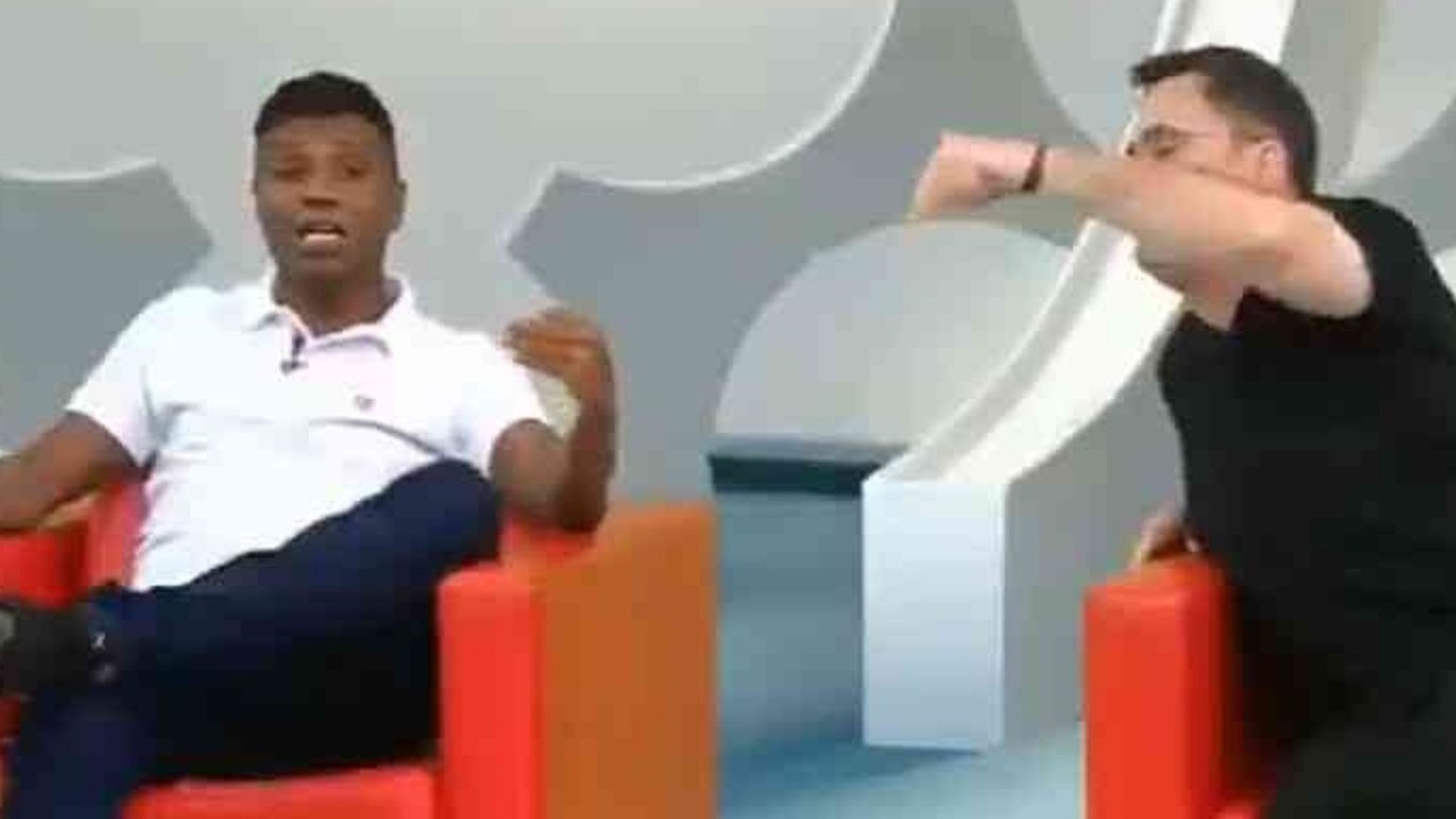 Ex-jogador Edilson e repórter Fernando Fernandes batendo boca, ao vivo, em Os Donos da Bola, na Band