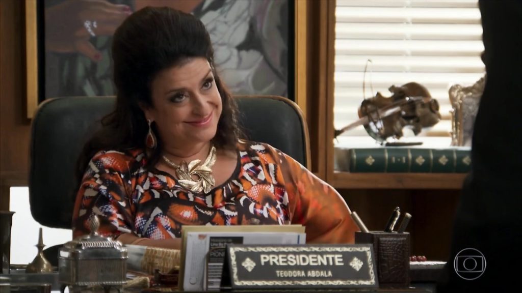 Teodora (Grace Gianoukas) em Haja Coração