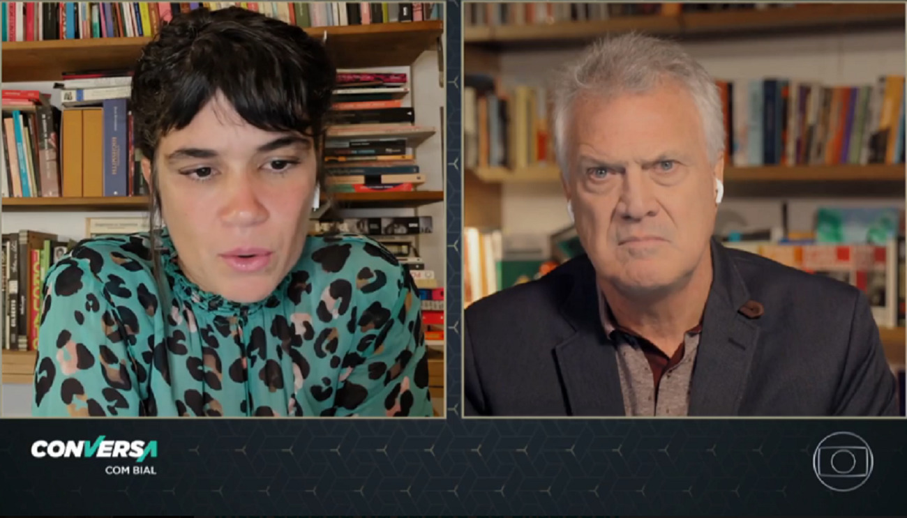 Luana Carvalho e Pedro Bial