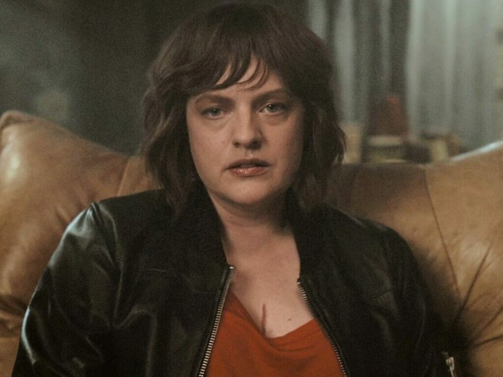 Elisabeth Moss na última cena de Iluminadas; confusa igual ao telespectador