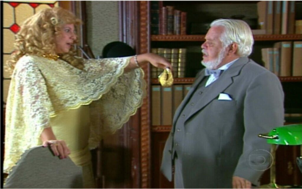 Dália (Carla Daniel) e Klaus (Cláudio Corrêa e Castro) em Chocolate com Pimenta