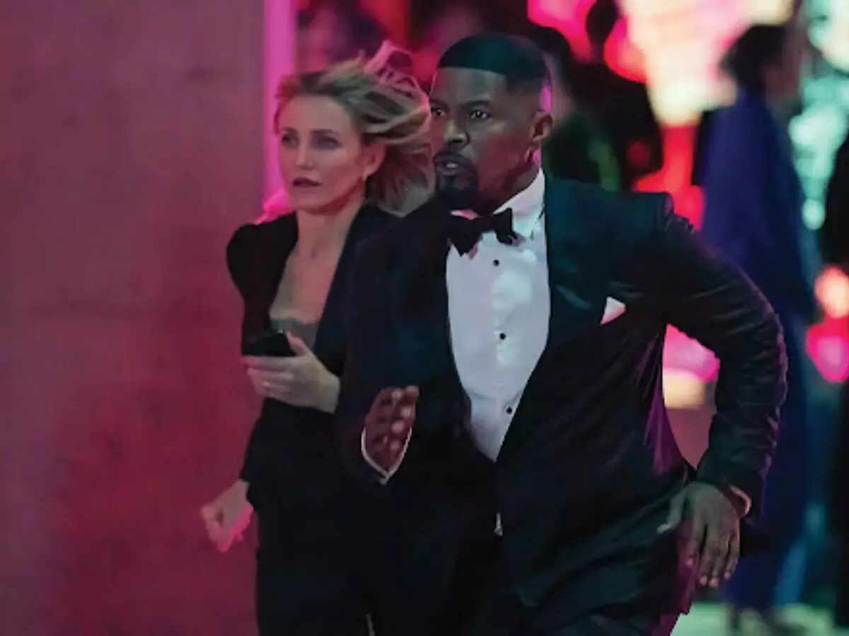 Emily (Cameron Diaz) e Matt (Jamie Foxx) em De Volta à Ação